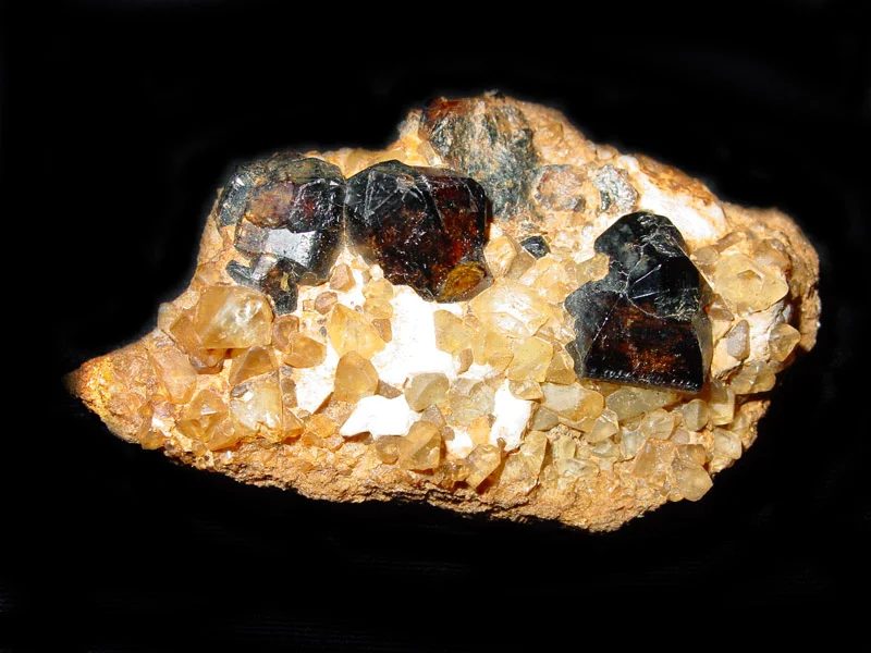 Fotografie minerálů Kassiterit, Topaz z lokality Modot, Mongolia