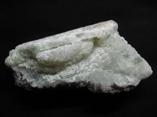 Fotografie minerálů Axinit-(Fe), Prehnit z lokality Libodřice, Czech Republic